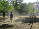 Playing volleyball on the dusty court at Crystal Lake Park